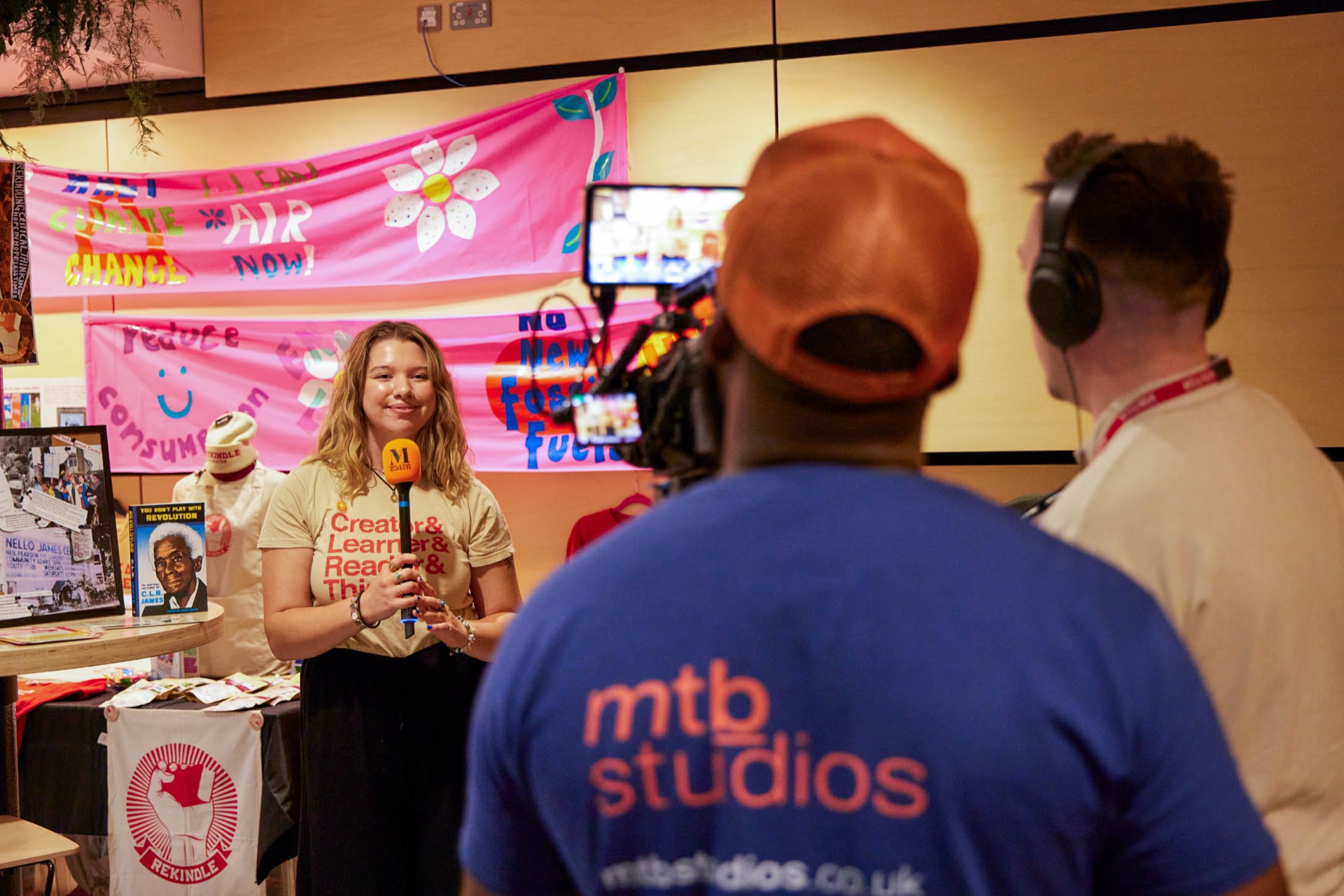 The mtb studios crew filming an interview at Melanin Markets
